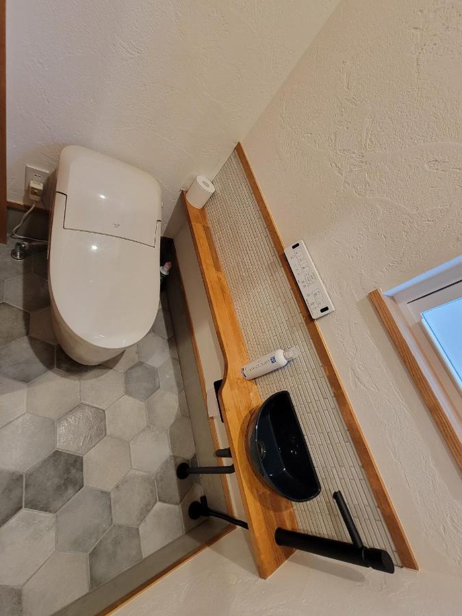Hotel 泊まる寿司屋一力 Sushi House à Itoshima Extérieur photo